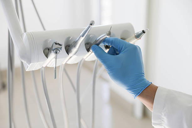 Professional Tooth Extraction technician working in Emerald Isle, NC